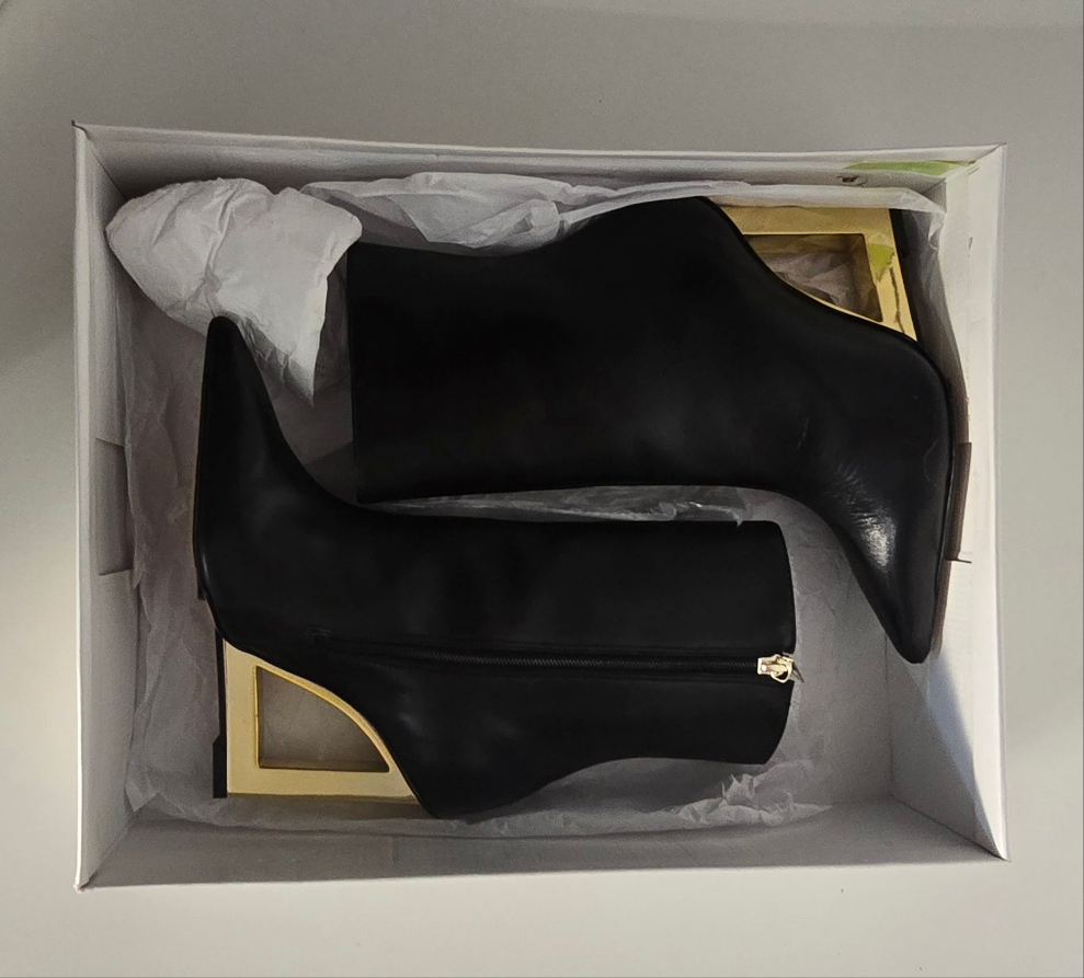 schutz filipa bootie – black leather with gold cutout heel – size 7.5b (usa)
